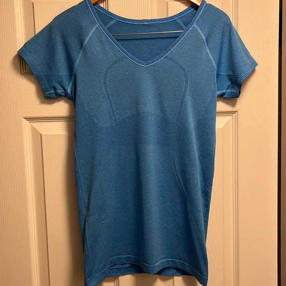 Lululemon Swiftly Tech V-neck short sleeve T-shirt. Color is a light blue.